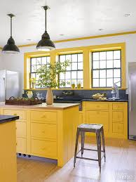 Modern kitchen decor in black and yellow looks impressive. 25 Lively And Bold Grey And Yellow Kitchens Shelterness