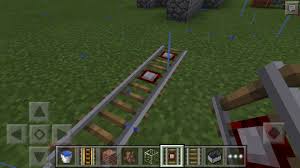Place a stick, and then a redstone torch, and then a stick in the middle column. How To Build A Powered Train Track On Minecraft 8 Steps Instructables