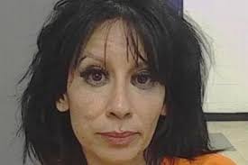 Florida woman 'stabbed boyfriend's children, 10 and 14, after argument over  dinner'