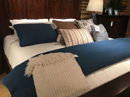 Dark Tan White And Navy Blue Make For The Perfect Color Combination For Any Master Bedroom Pair It With The Per Master Bedroom Redo Blue Bedroom Tan Bedroom
