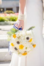 Maybe you would like to learn more about one of these? White Anemones And Yellow Rose Bouquet