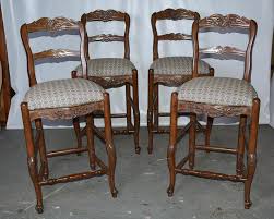 French provincial kitchen with white subway tile and marble bench. French Country Louis Xv Style Counter Bar Stools At 1stdibs