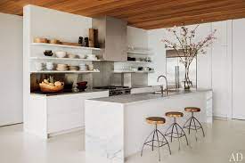 White cabinets in this stylish and detailed kitchen help to provide a contrast to the primarily creamy and peach colors. White Kitchens Design Ideas Architectural Digest