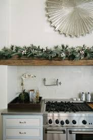 Ho Ho Faux A Quick Guide To Holiday Decor With Artificial Greenery Marie Flanigan Interiors Kitchen Cabinet Styles Above Cabinet Decor Decor