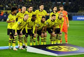Dortmund slip up again with 1-1 draw at Augsburg to stay ...