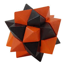 The numbered pieces correspond to the colored pieces in the photo with the following mapping: Wood Star Puzzle Mr Puzzle