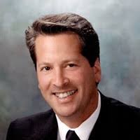 John E. Dewald, C.P.A.