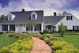 Stone and brick fireplaces & chimneys. White Cape Cod Style Mother Daughter Press