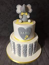 Knitted Effect Baby Shower Cake With Elephant Topper Grey And Yellow Theme Elephant Baby Shower Theme Baby Shower Yellow Elephant Baby Shower Boy