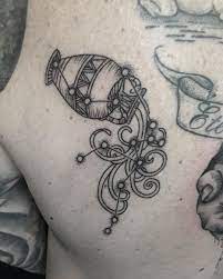 Go with the classic design of a man or woman pouring water from a jug. Aquarius Tattoo Water Bearer Tattoo Aquarius Tattoo Aquarius Symbol Tattoo Tattoos