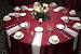 White And Burgundy Table Setting