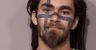 Tattooed man arrested after causing disturbance