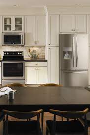 You can see and touch the bosch appliances with the black stainless steel finish at. Sleek Stainless Steel Appliances Without Smudges And Fingerprints You Can Have It All Whirlpool S Cheap Kitchen Cabinets Kitchen Design Small Kitchen Design
