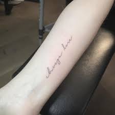 In parentheses (one offset slightly to the left, the. These Quote Tattoos May Be Small But They Re Mighty With Meaning Brit Co