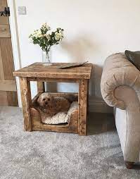Comprised of seven pieces of wood, the table is held together via rubber bands, without any glue or fasteners. Solid Chunky Wooden Side Table Lamp Table Coffee Table With Cosy Hideaway Pet Bed Area With Latted Base S Coffee Table Dog Bed Cosy Bed Wooden Dog Bed