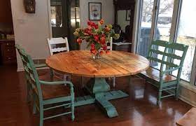 We are here to help you find the tables with just the right look, feel and atmosphere you envision for your home. Dining Table Reclaimed Wood Custom Handcrafted Round Plank Handmade Made In Usa French Pedestal Kitchen Table Round Dining Room Custom Farmhouse Table