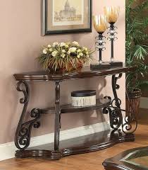 For over 100 years, safavieh has been crafting rugs of the highest quality and unmatched style. The Living Room Traditional Occasional Tables Sir Rawlinson Sofa Table Deep Merlot And Clear 702449 Available At Furniture Place Serving Temple Hills And Forestville Md