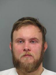 Man holds burglar until police arrive