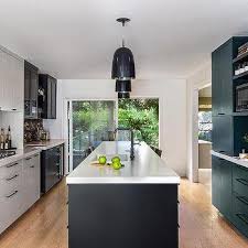 Black Island With White Cabinets Design