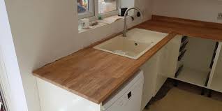 A.stone worktops 1.project/custom vanity top 2.boxed vanity top 3.boxed top preinstalled wt sink 4.tub surround 5.kitchen counter b.bathroom porcelain ceramic 1.undermount sinks 2.drop in sinks 3.vessel bowls 4.toilets c.kitchen stainless steel d.faucets 1.bathroom 2.kitchen e.cabinets 1.bathroom vanity base 2.kitchen cabinet f.natural stone. Oak Worktop Installation In Prenton Wirral England Worktoppro