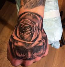 Rose And Skull Hand Tattoo For Men By Jezabell Morgan Jezabellmorgan Hand Tattoos For Guys Hand Tattoos Skull Hand Tattoo