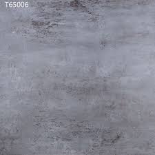 Glazed smooth finish with a low sheen and slight variation in tone. China 24x24 Cement Look Tiles For Construction Building Outdoor China Cement Floor Tile Concret Look Tile