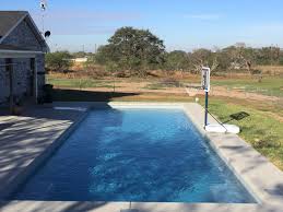 Leisure Pools Newest Composite Fiberglass Swimming Pool The Supreme Is Now Ready For Basketball Sea Fiberglass Swimming Pools Leisure Pools Swimming Pool Spa