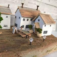 driftwood art wooden sculpture wooden houses and a pub etsy haus aus holz treibholz arbeiten kunst aus treibholz