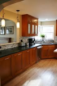 Wine Bottle Lights And Honey Brown Cabinets Granite Countertops Kitchen Cherry Cabinets Kitchen Cherry Wood Kitchen Cabinets