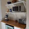The shelf is not adjustable. 1