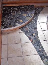 All River Rock Flooring Inlay For Our Bathrooms It Is River Rock Floor Rock Floor Shower Remodel
