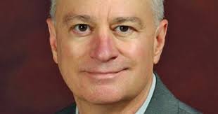 Friends, business leaders mourn Benjamin's death