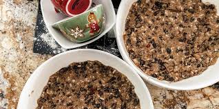 A traditional english and british christmas dinner includes roast turkey or goose, brussels sprouts, roast potatoes, cranberry sauce, rich nutty stuffing, tiny sausages wrapped in bacon (pigs in a blanket) and lashings of hot gravy. How To Make The Royal Family S British Christmas Pudding Recipe