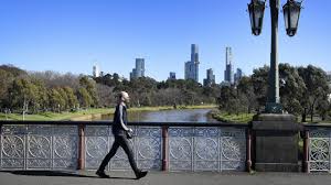 Anti lockdown protesters march from flinder street station to parliament house in melbourne. Lqarffmp 8c M