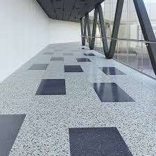 Real terrazzo is actually a poured in place seamless floor with no grout joints. How To Install Terrazzo Floor Tiles Installing Terrazzo