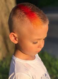 A man with long dreaded locks pulls back his hair into a ponytail and doesn't have to worry about it being a simple style when a fade haircut is incorporated. 31 Best Boys Fade Haircuts Look Like A Super Star
