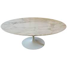 A table cloth would cover it completely, which is a waste. Eero Saarinen Round Marble Knoll Tulip Cocktail Table At 1stdibs