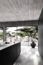 Maybe you would like to learn more about one of these? Contemporary Home With Bare Concrete Walls And A Black Kitchen My Paradissi