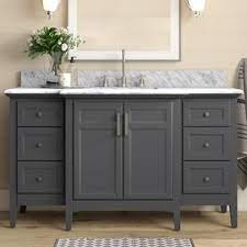 This master bathroom double sink vanity is lit by a strip of warm white leds, as well as two modern bathroom pendants. 60 Inch Bathroom Vanities Joss Main