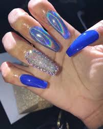 The glossy shade of midnight offers a fresh take on nail art designs, often resulting in a daring and bold look. Ig Bold Beautycollective Long Acrylic Nails Blue Nails Holographic Nails