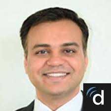 Dr. Munish Ashat, MD