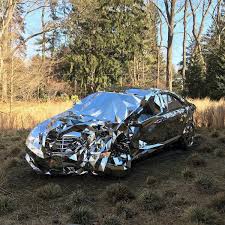 A Wrecked Luxury Car Built From Over 12 000 Reflective Steel Parts Mercedes Benz S550 Reflective Sculpture Car