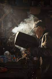 Working In Basement Welder Working At Home Workshop With Work Tools And Protective Equipment Blue Collar Worker Work Tools Home Workshop