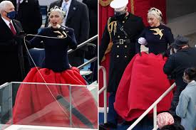 The fbi is reportedly investigating if there were political motives behind the dognapping of lady gaga's bulldogs after she sang at president joe biden's inauguration last month. Lady Gaga Dons Schiaparelli Gold Dove For Inauguration Performance