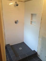 Custom Shower Built Using Schluter Kerdi Shower System Black 8x10 Tile Installed On Bathroom Floor And Shower Shower Curb Bathrooms Remodel Apartment Bathroom