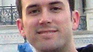 Giffords Staffer Memorial Shadowed by Gun Debate, Boston Attack