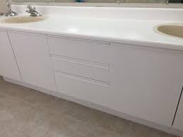 Detailed tutorial on how to make over an ugly sink with paint. How To Paint A Vanity Counter Top And It S So Easy