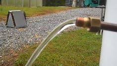 How To Make Endless Hot Water Without Electricity Using Some Recycled Parts A Small Rocket Stove And Coiled Copper Survival Survival Prepping Off Grid Living