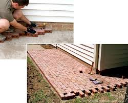 Press the pavers down rather than sliding them across the sand to prevent disruption of the base. How To Build A Brick Patio The Scrap Shoppe