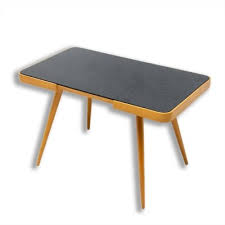 The legs are made to look like they go through the base; Mid Century Opaxite Glass Coffee Table By Interier Praha Czechoslovakia 1960s 145561